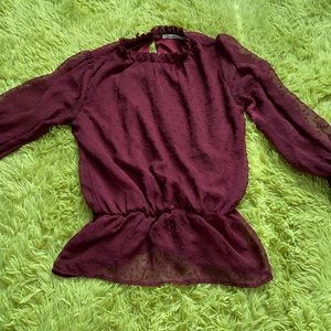 Maroonish colored long sleeve blouse